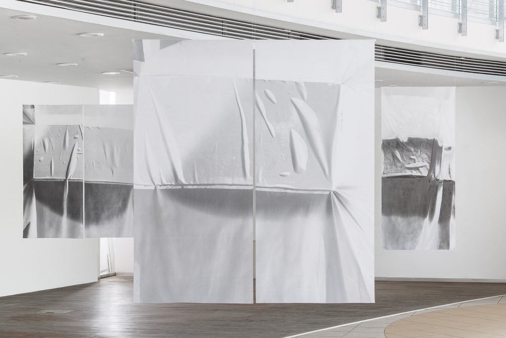 large artwork in a white space